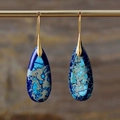 Detailed close-up of bohemian blue imperial stone teardrop earrings with gold-plated hooks - Blue + Gold Hook