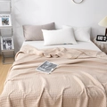 Detailed close-up of cream waffle weave cotton blanket texture and hem stitching quality - 200*230cm / Khaki