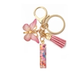Pink butterfly keychain with resin heart sequins and tassel on golden metal ring - Letter I