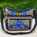 Ethnic black crossbody bag with blue floral embroidery and multiple zipper pockets - Blue Rose