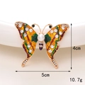 Squisita spilla a farfalla dorata con ali multicolori ed eleganti perle bianche - D1250 Farfalla Dorata