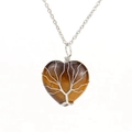 Macro shot of silver wire wrapped tree of life on tiger eye heart stone necklace - Silver+Tiger Eye