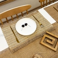 Jute color woven placemat with tassel edges on a wooden table with white plate - Jute Fringe Mixed Beige