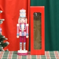 Macaron color cake-top nutcracker in pink and white with a red gift box display - 38cm / Pink Cake Head (TN3842)