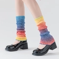Rainbow gradient wool knit arm warmers in a loose slouchy style for women - Leg Warmers / Gradient Rainbow / 【product Attributes】the Displayed Product Is A Pair Of 【rainbow-colored】【slouch Socks】 【knitted Material】 Color Gradient 【loose Fit】 And Adjustable Length. 【visual Presentation】model Wearing The Socks Against A Pure White Studio Background With Bright And Even Lighting. Image Quality Is High With Clear And Sharp Images Good Color Reproduction And No Noise. Aesthetic Appeal Is High With A Simple Composition Eye-catching Color Scheme And Excellent Display Effect. 【text Content】no Visible Text Logos Or Watermarks. 【review Conclusion】passed; Images Are Clear And Without Violations And Can Be Used Directly. 【logistics Labels】none; It Is A Common Textile Product With No Special Logistics Requirements. 【infringement Risk】none; No Specific Brand Logos Or Classic Designs Were Identified Resulting In A Low Risk Of Infringement. 【product Parameters】material: Knitted; Color: Rainbow Gradient; Style: Slouch Socks.
