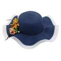 Detail of woven straw hat featuring orange fabric flowers and white wavy brim edges - One Size / Navy Blue