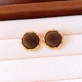 Detailed view of vintage gold-rimmed irregular earrings with deep brown flocked texture - Round / Brown