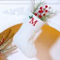 White knitted Christmas stocking with cable pattern and red embroidered letter S - Letter S / White