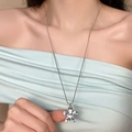 Bohemian silver flower pendant necklace on model showing delicate metal chain design - Silver Metal Hollow Flower Necklace (X5270)