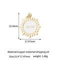 Detail showing a golden sun pendant with 11:11 engraving and 22.4mm size marking - 14K Gold/Sun 11:11/White