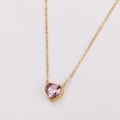 Elegant gold-tone necklace featuring a faceted pink heart zircon pendant on a link chain - Gold / Purple