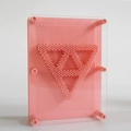 Pink 3D pin art toy made of plastic with a triangular pattern inside - Large / Light Pink