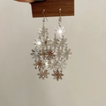 Boucles d'oreilles pendantes fleurs argentées avec pétales de tournesol polies - Frange de Tournesols Multicouches Argentée