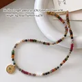 Tiger eye beaded necklace with natural colorful stones, pearls and a golden sun pendant - Sunflower Tourmaline Necklace XL0735