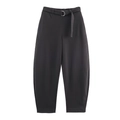 Close-up of high-waist velvet trousers featuring a matching belt and metal D-ring buckle - XS / Bottoms / Carbon Color