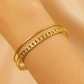 Golden double-layer bracelet set featuring twisted rope and Cuban link chain designs - Cuban Chain Layered Set (1909)