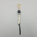 Detail of MAMA letter silicone bead keychain with leopard print and black tassel fringe - Black Leopard Tassel Style