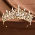 Luxurious gold bridal crown with sparkling crystals on brown silk background - Gold Rainbow Diamond
