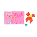 Pink silicone bow mold with colorful fondant bow samples for cake decorating and DIY baking - Style 1-Combination Bowknot (1#19-14) / Pink