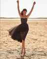 Elegant strapless black tulle evening gown with a corset bodice and layered puffy skirt - US size 2 (S) / Black