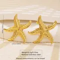 Golden stainless steel starfish stud earrings with realistic textured finish and 3.5cm size - Starfish Detail Spec (FYD6213)