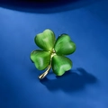 Exquisite clover brooch with green cat-eye stone petals and golden metal setting - Gold Green Cat Eye Clover
