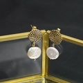 Vintage gold spiral earrings with white baroque pearls shown on a glass display box - Spiral Stud White Small-12mm