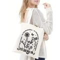 Detail view of white canvas tote bag with black floral art and religious text print - There Was Jesus Faith Print