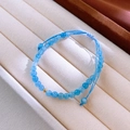 Adjustable crystal beaded bracelet with blue translucent stones and gold accent bead - 132 Style / 10mm (16 Beads) / Blue