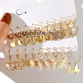 Exquisite gold alloy earring set with butterfly and heart charms on fashion jewelry card - Gold Heart Butterfly Enamel Style (5619901)
