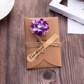 Vintage kraft envelope with purple flower and Especially for you tag on wood - 04 Purple Carnation