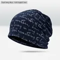 Navy blue beanie hat with stylish white script font print for men and women - All-over Script Print Style / Navy Blue