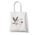 White canvas tote bag featuring minimalist black line art face and botanical leaf print - Style K (Botanical Face)