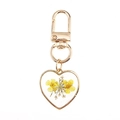 Detail of heart resin keychain featuring real yellow dried flowers and gold clasp - Heart Yellow Flower