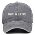 Detail of white Made in the 90's embroidery on washed dark grey cotton baseball cap - Gray