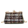 Pochette da sera in tweed con paillettes, manico ad anello dorato e catena sottile - Nero