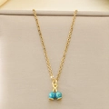 Macro detail of dopamine style dragon fruit pendant necklace in blue and gold finish - Lake Blue Double Bead Fruit Style (KN292105-Z)