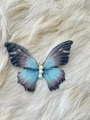 Sweet blue gradient mesh butterfly hair clip with pearl detail on beige plush background - Black Blue Butterfly