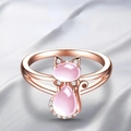 Rose gold minimalist cat ring with pink crystals and small diamonds on satin background - US 7 / Rose Gold