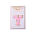 Close-up of pink chenille letter Y patch with gold glitter edge and peel and stick adhesive - Letter Y / Pink