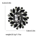 Vintage sunflower alloy brooch with large grey gemstone and black rhinestones - Gunmetal