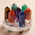 Set of 8 colorful crystal resin hexagonal pillars with stones on a clear round base - Seven Colors with Base