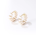 Vintage hoop earrings featuring elegant gold-plated metal and white enamel striped texture - White Gold Mixed