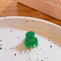 Mini green handmade resin hair claw clip in France style on white patterned plate - Dark Green