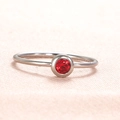 Minimalist stainless steel ring featuring a round red birthstone in a bezel setting - US Size 7 / Steel-Ruby Red (Jul)