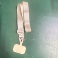Universal beige nylon phone lanyard with adjustable plastic buckle and metal hook - Off White