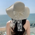 Beige wide brim straw sun hat with white floral lace bow and wavy edge design - Large Brim Flower Style - Creamy White