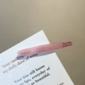 French style slim pink resin hair clip with gold lettering on a vintage card background - Pink
