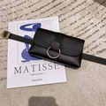 Chic black leopard stripe waist bag with gold ring buckle on art magazine background - Black