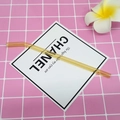Eco-friendly amber bent borosilicate glass straw on a minimalist pink grid background - 8*200mm / Honey Yellow Bent